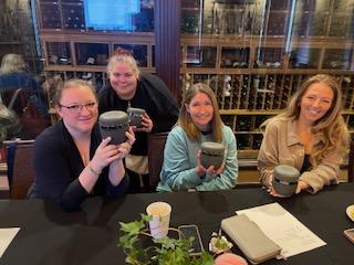 Kelly, Liz, Brandy and Tori Showing off gift from client